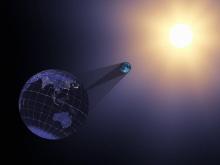 Illustration du 21 juin 2017 de la Nasa représentant la Terre, la Lune et le Soleil lors d'une éclip