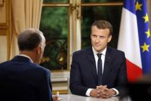 Emmanuel Macron s'apprêtant à répondre aux questions de journalistes depuis l'Elysée, le 15 octobre 