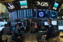 Traders à la Bourse de New York, le 22 novembre 2017