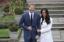 Le prince Harry et sa fiancée l'actrice Meghan Markle à Londres le 27 novembre 2017 lors de l'annonc