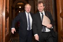 Le ministre britannique des Affaires étrangères Boris Johnson (g) et Richard Ratcliffe, le mari de l