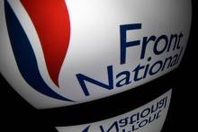 Le logo du Front National sur l'écran d'une tablette le 13 octobre 2016 à Paris