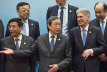 Visiting British finance minister Philip Hammond has been cozying up to Beijing