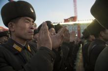 North Korean soldiers attend a mass rally to celebrate the North's declaration on November 29 it had