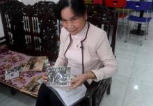 Hoang Thi No membre de l'unité guerrière secrète la "Rivière des parfums" chez elle à Hue au Vietnam, le 17 janvier 2018