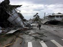 Photo fournie le 13 février 2018 par John Pulu de Tagata Pasifika montrant les dégâts provoqués par le passage du cyclone Gita à Nuku'alofa, la capitale de l'archipel des Tonga