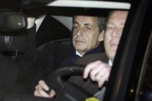 L'ancien président de la République Nicolas Sarkozy, à Paris, quittant le parquet financier de Paris
