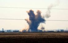 Une explosion provoquée par un tir de mortier de l'Armée syrienne libre, à proximité de Deir Ezzor, 