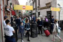 Les touristes à Venise expérimentent le 1er mai 2018 une mesure inédite de portiques d'accès à la cité lagunaire