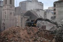 Déblaiement le 7 mai 2018 des décombres après l'effondrement d'une tour à Sao Paulo six jours plus tôt.