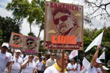 Des supporteurs de l'ex-dirigeant des Farc, Jesus Santrich, manifestent le 1er mai 2018 à Cali, en Colombie