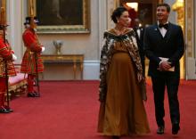 La Première ministre néo-zélandaise Jacinda Ardern et son compagnon arrivent à Buckhingham Palace le 19 avril 2018 pour le dîner en l'honneur des chefs de gouvernement du Commonwealth.