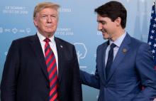 Donald Trump (g) et Justin Trudeau en marge du sommet du G7, à La Malbaie, au Québec, le 8 juin 2018