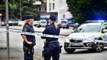 Cordon de police après la fusillade dans le centre de Malmö en Suède, le 18 juin 2018