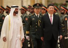 Le président chinois Xi Jinping et le prince héritier d'Abou Dhabi, Mohammed ben Zayed Al-Nahyane, au palais présidentiel d'Abou Dhabi le 20 juillet 2018.