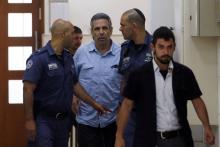 Gonen Segev, ancien ministre israélien accusé d'espionnage pour l'Iran, arrive au tribunal à Jérusalem, le 5 juillet 2018