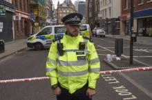 Un policier devant une rue interdite d'accès à Londres le 5 juin 2017