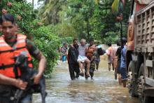 Un quartier situé dans le nord de Cochin, principale ville de l'Etat indien du Kerala, inondé après des pluies torrentielles, le 18 août 2018