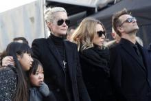 (g-d): Laeticia Hallyday, ses filles Jade et Joy, Laura Smet et David Hallyday lors des funérailles du chanteur Johnny Hallyday, le 9 décembre 2017 à Paris