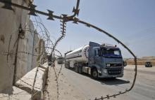 Des camions au terminal de Kerem Shalom, seul point de passage de marchandises entre Israël et la Bande de Gaza, le 24 juillet 2018