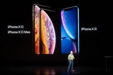 Phil Schiller, vice-président marketing d'Apple, présente de nouvelles versions très haut de gamme de l'iPhone au siège de Cupertino, en Californie, le 12 septembre 2018
