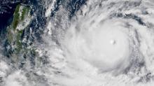 Image satellitaire prise le 13 septembre 2018 à 02H00 GMT montrant le typhon Mangkhut se dirigeant vers la côte des Philippines. AFP PHOTO / NOAA/RAMMB