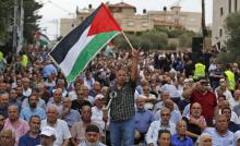 Photos de manifestants arabes israéliens contre la loi sur "l'Etat-nation du peuple juif" à Jatt (Israël) le 1er octobre 2018.