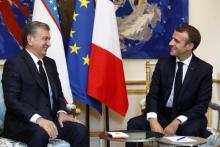 Le président français Emmanuel Macron et ouzbek Shavkat Mirziyoyev au Palais de l'Elysée à Paris, le 09 octobre 2018