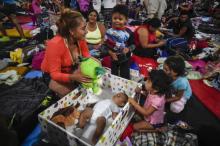 Des migrants centraméricains dans un stade aménagé à Mexico, Mexique, le 7 novembre 2018