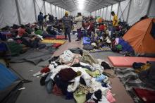 Des milliers de migrants d'Amérique centrale, en route vers les Etats-Unis au sein d'une caravane, font une pause le 6 novembre 2018 à Mexico.