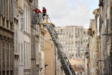 Des services de secours interviennent le 10 novembre 2018 près des immeubles effondrés à Marseille le 5 novembre 2018