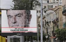 Affiche dans une rue de Beyrouth, le 6 décembre 2018, en soutien à l'homme d'affaires d'origine libanaise, Carlos Ghosn, interpellé au Japon sur des accusations de malversations
