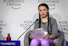 La jeune activiste suédoise Greta Thunberg (C) au Forum économique le 25 janvier 2019, à Davos, Suisse