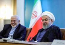 Le président iranien Hassan Rohani (d) et son ministre des Affaires étrangères Mohammad Javad Zarif, le 22 juillet 2018 à Téhéran