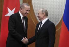 Le président russe Vladimir Poutine (d) et son homologue turc Recep Tayyip Erdogan, le 14 février 2019 à Sotchi
