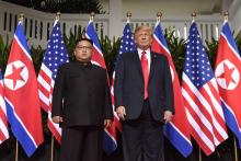 Le président des Etats-Unis Donald Trump et le dirigeant nord-coréen Kim Jong Un lors de leur premier sommet à Singapour, le 12 juin 2018