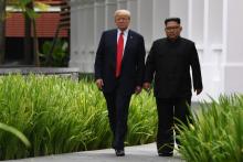 (Donald Trump et Kim Jung Un lors de leur premièr rencontre, en juin 2018 à Singapour