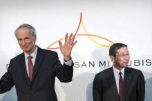 Le logo de Renault, Nissan et Mitsubishi, pris en photo avant une conférence de presse au siège de Nissan à Yokohama dans la banlieue de Tokyo, le 12 mars 2019
