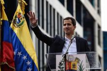 Le chef du Parlement vénézuélien Juan Guaido s'autoproclame "président" par intérim, le 23 janvier 2019 à Caracas