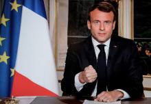 Le président Emmanuel Macron s'adressant aux Français dans une allocution télévisée à Paris le 16 avril 2019