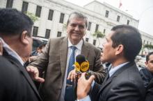 Peruvian former president Alan Garcia arrives at the prosecutor's office in Lima on November 15, 2018