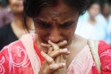 Une Indienne chrétienne prie pour les victimes des attants du Sri Lanka à Kolkata le 23 avril 2019