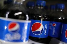 Des bouteilles de Pepsico dans une épicerie en Californie, le 13 février 2018. Le géant américain des boissons et des snacks veut investir, en partenariat avec le groupe mexicain Grupo Gepp, 4 milliar