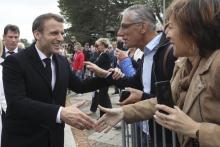 Emmanuel Macron sort de son bureau de vote au Touquet, dans le Pas-de-Calais, le 26 mai 2019