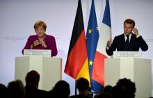 Le président français Emmanuel Macron et la chancelière allemande Angela Merkel à l'Elysée le 13 octobre 2019