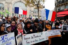 Le leader de La France Insoumise (LFI)Jean-Luc Mélenchon(G)participe à la manifestation mais pas le député LFI Francois Ruffin (D), à Paris, le 15 octobre 2019