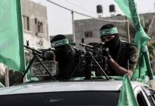 Parade des combattants de la branche armée du Hamas à Khan Younès dans la bande de Gaza, le 20 juill