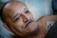 Alain Cocq, atteint d'une maladie incurable et qui a fait deux grèves des soins et de la faim en 2020 pour réclamer le droit à l'euthanasie, chez lui à Dijon le 6 avril 2021