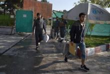 Arrivée à l'aéroport international de Kaboul de réfugiés afghans expulsés d'Allemagne, le 13 septemb