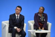 Manuel Valls, alors Premier ministre, et Christiane Taubira, à cette époque ministre de la Justice, lors d'une conéfrence de presse à Paris, le 23 décembre 2015